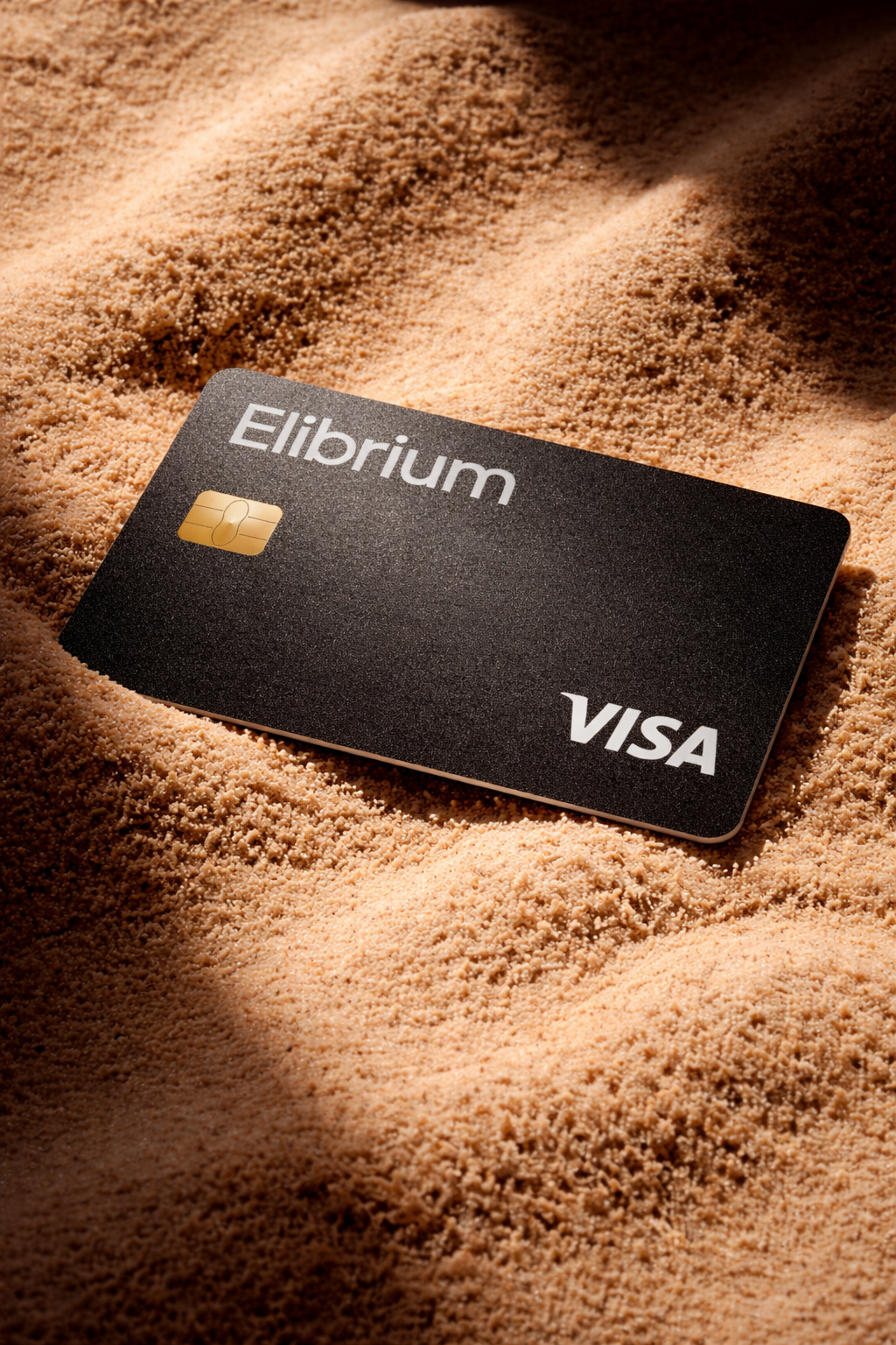 Elibrium Visa card on sand
